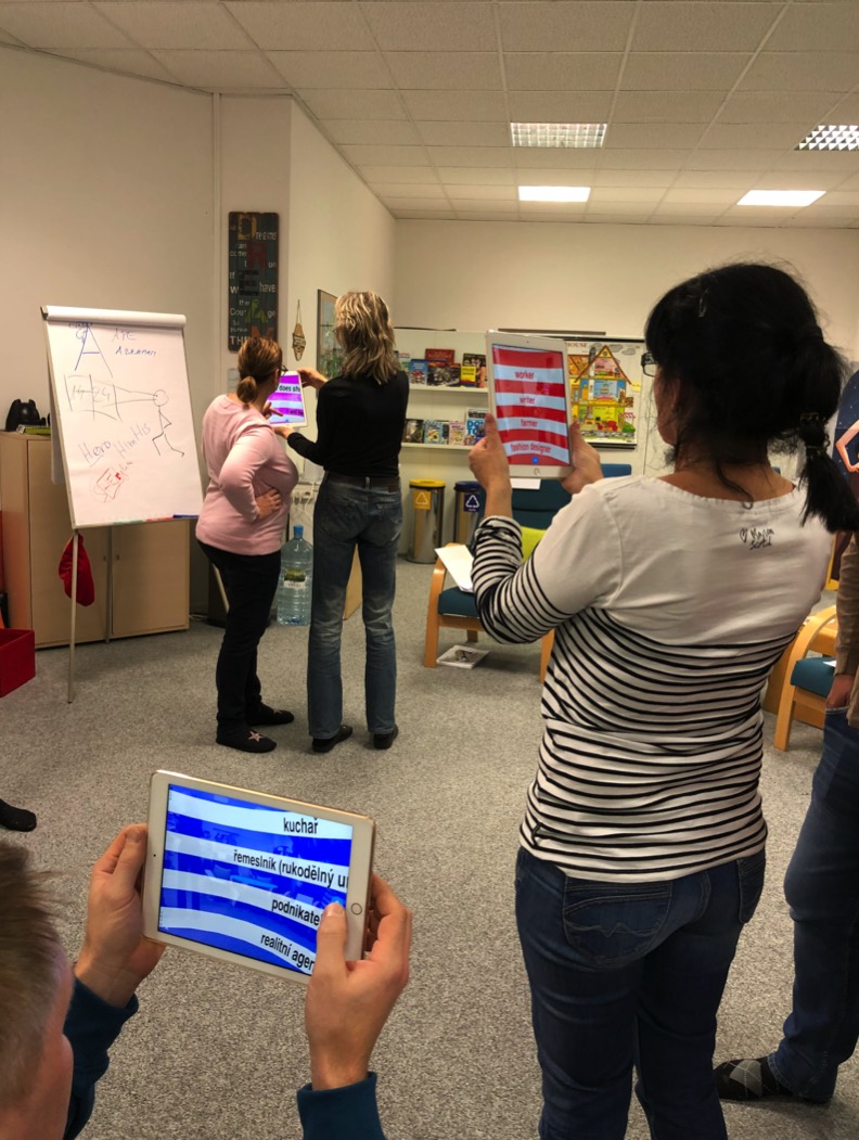 Participants entering floating AR spheres to find and memorize vocabulary words.